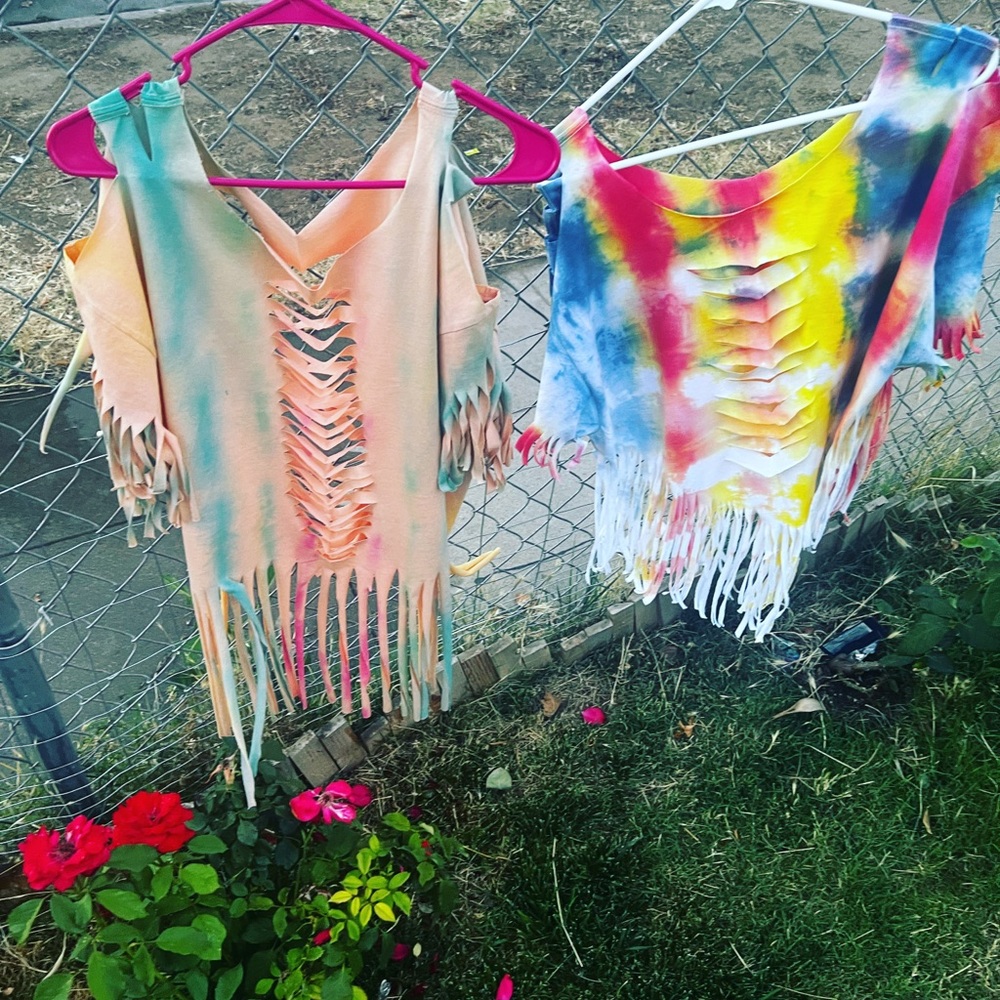 I design I tie-dye and cut up T-shirts
